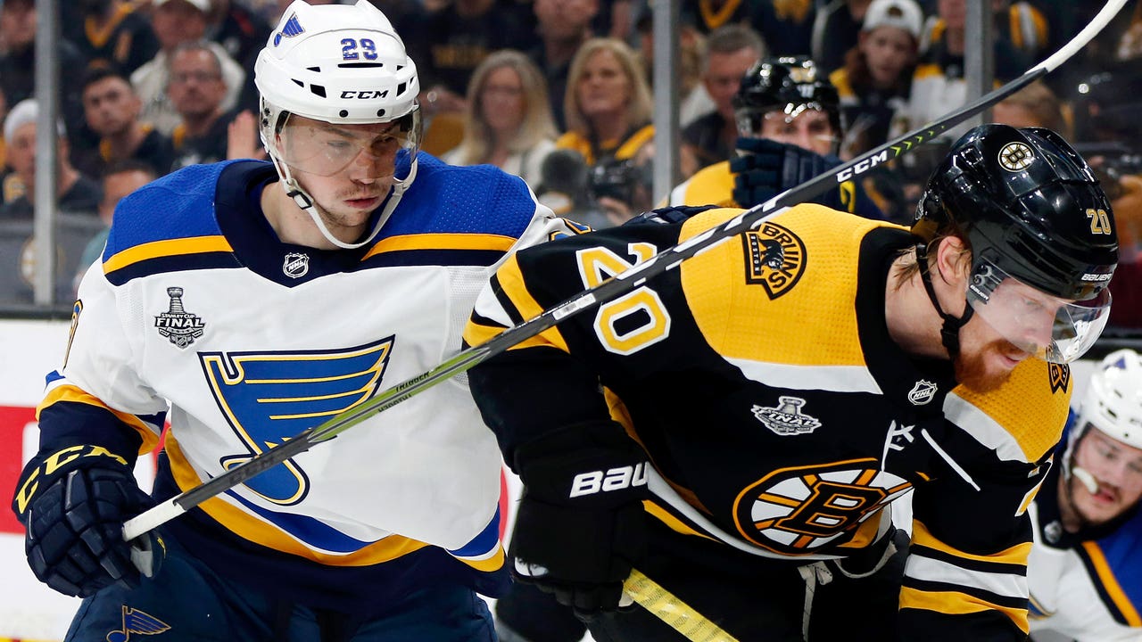 Blues' Dunn, Bruins' Chara play through pain to join jaw-dropping club